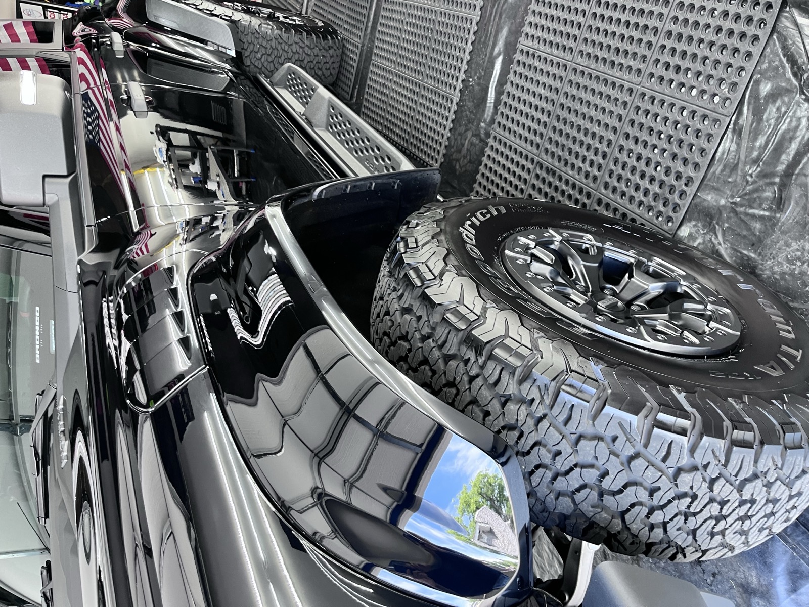 Detailed black Ford Raptor with a glossy, ceramic-coated finish by OG Detailing in Huntley, IL